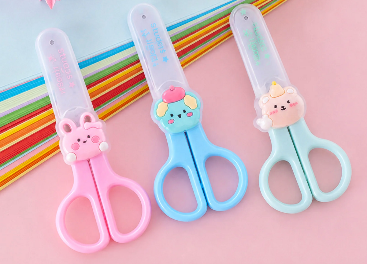 Scissor with cap